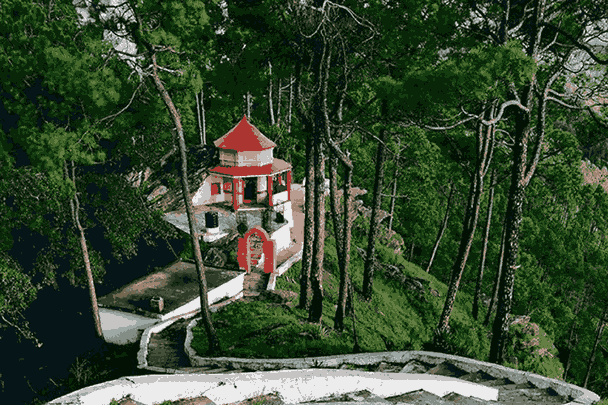 Kasar Devi Temple in Almora surrounded by pine forests and Himalayan mountain views