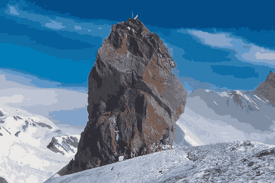 Shrikhand Mahadev peak in Himalayas showing sacred Shivling at 18,570 feet altitude during pilgrimage trek