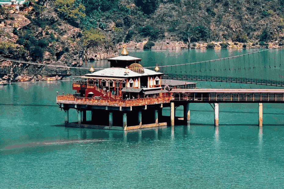 Dhari Devi Temple on the banks of the Alaknanda River in Uttarakhand surrounded by beautiful mountains and scenic views